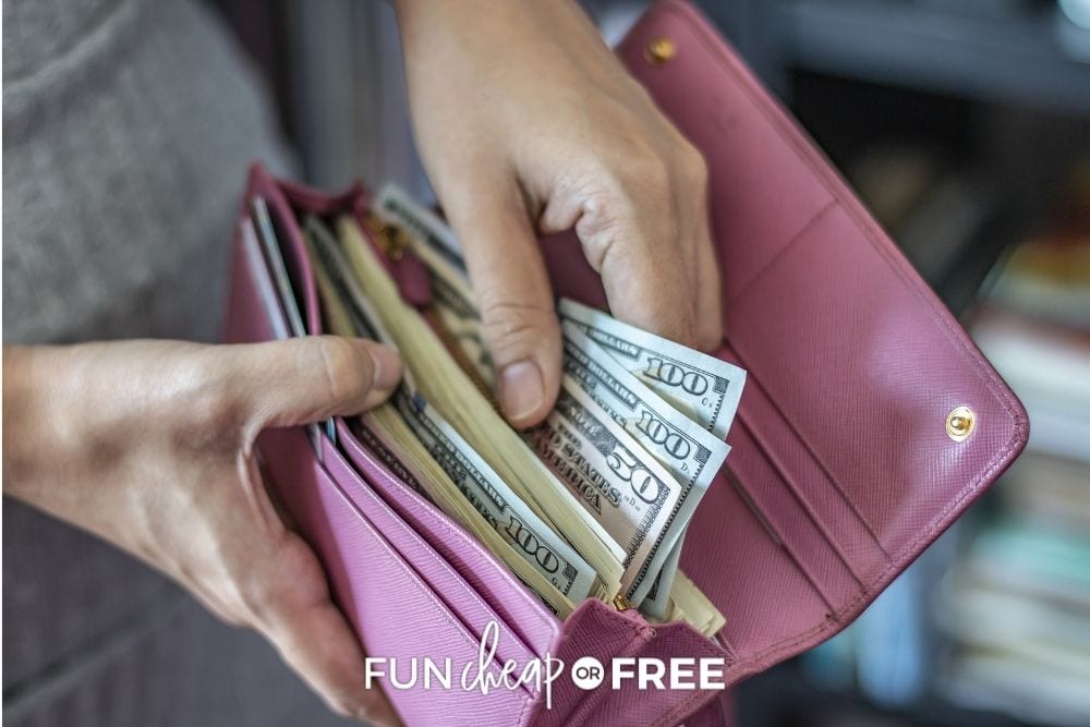 woman taking money out of her wallet, from Fun Cheap or Free