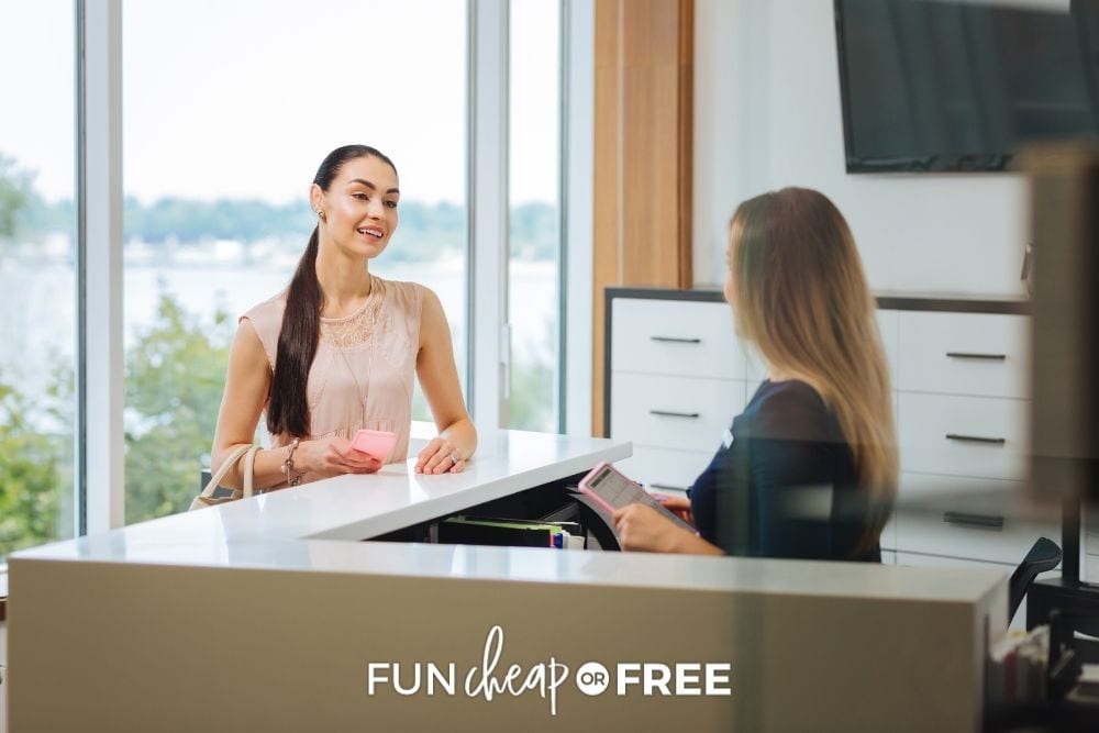 woman negotiating at cash register, from Fun Cheap or Free