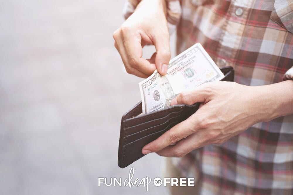 Man pulling cash out of wallet, from Fun Cheap or Free
