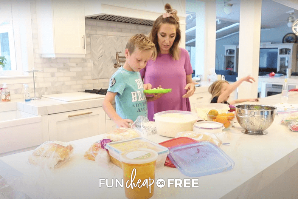 Jordan Page helping son make plate for dinner, from Fun Cheap or Free