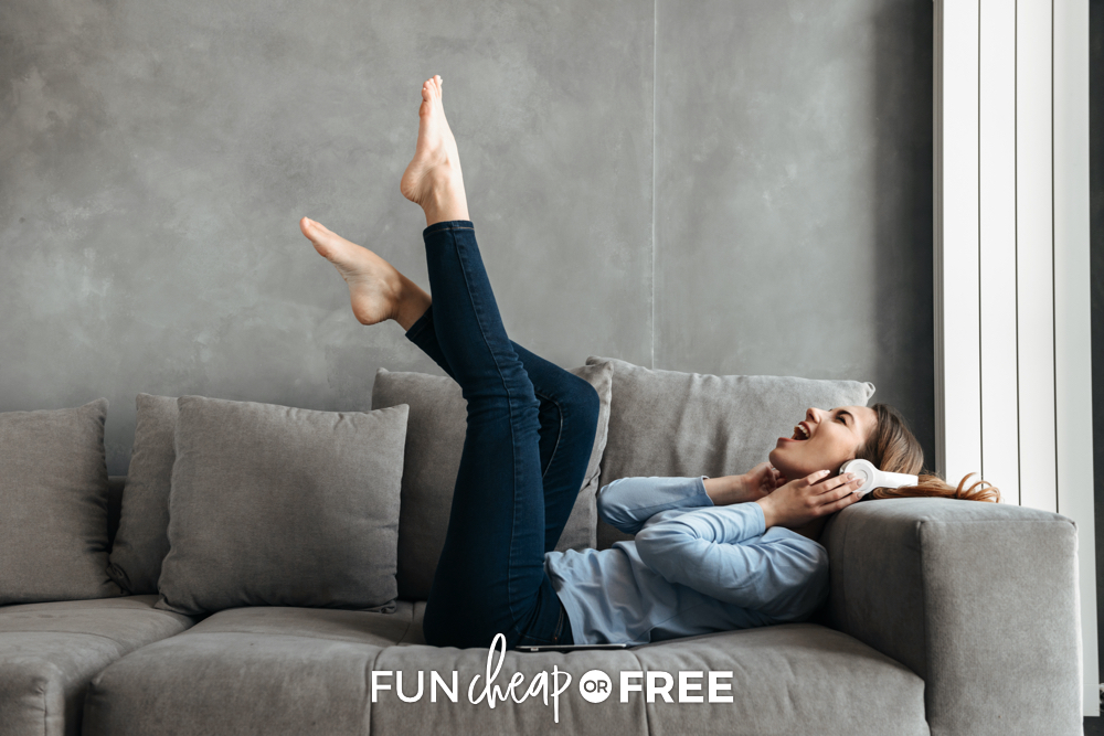 Woman listening to music on the couch, from Fun Cheap or Free