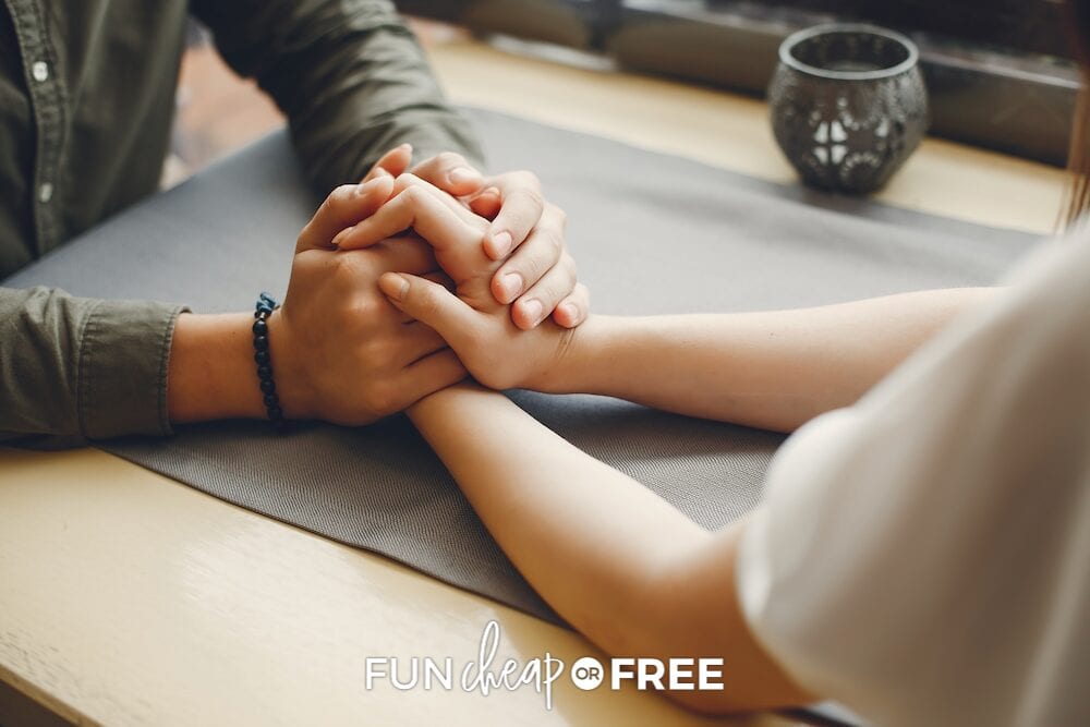 Couple holding hands during date night, from Fun Cheap or Free