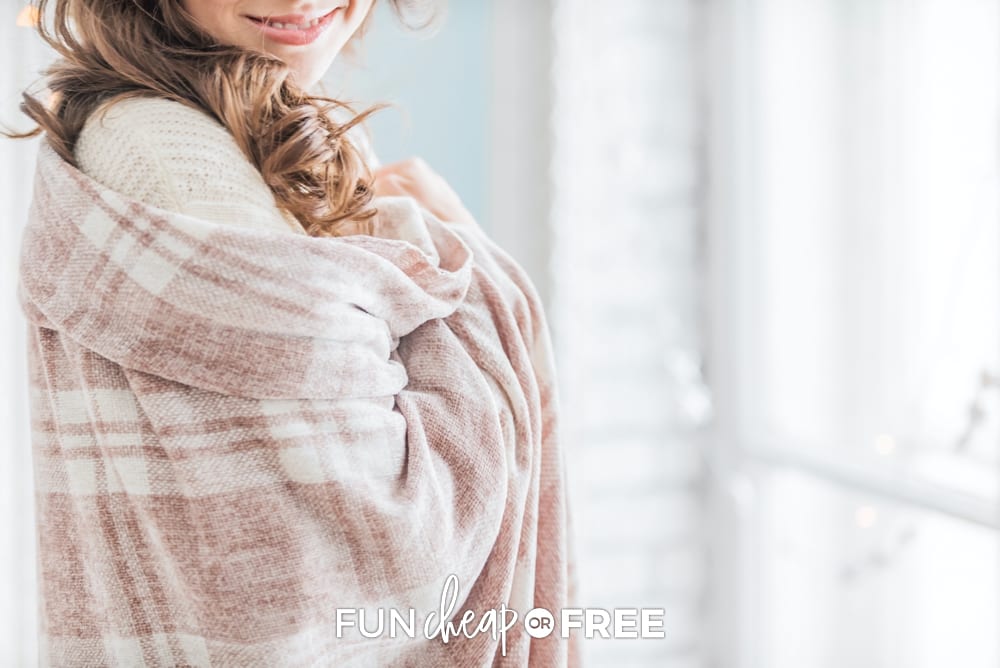 Woman wrapped in warm blanket, from Fun Cheap or Free