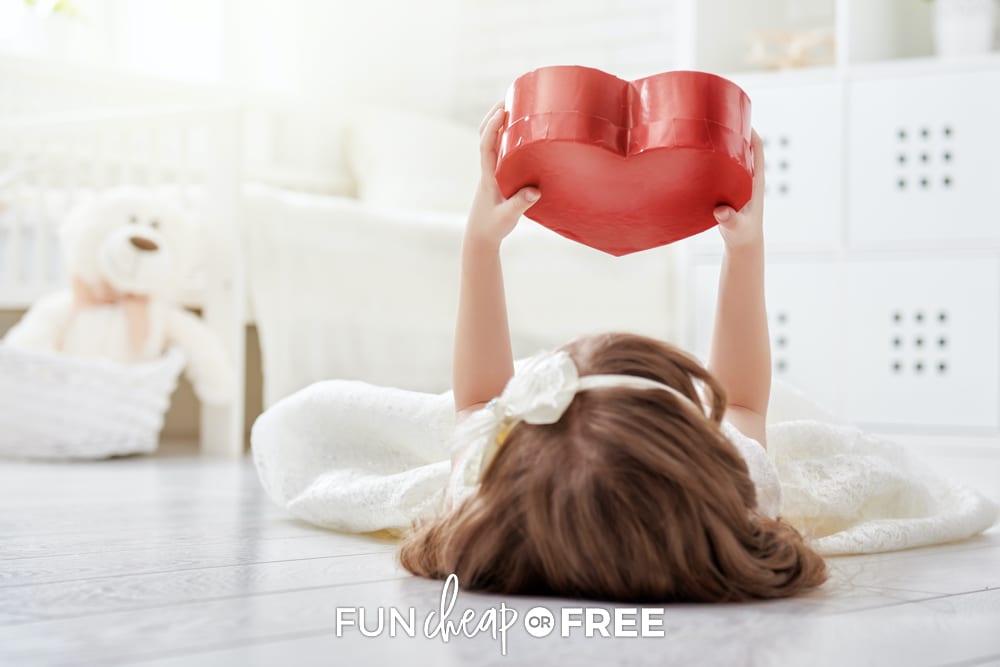 Little girl holding heart-shaped box, from Fun Cheap or Free