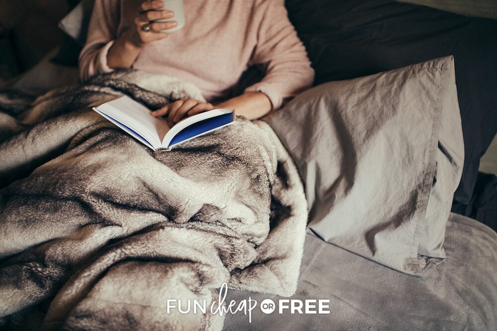 woman reading book in bed, from Fun Cheap or Free