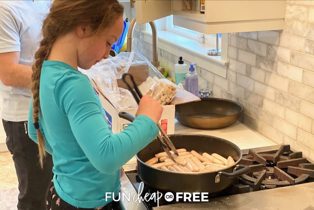 girl cooking dinner with family, from Fun Cheap or Free