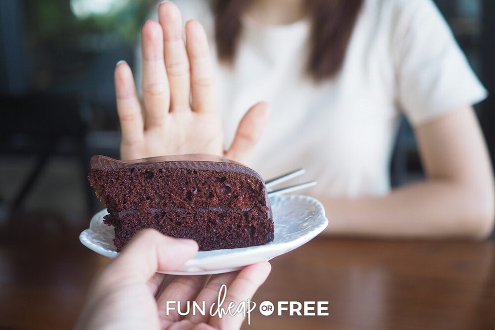 woman saying no to a piece of cake, from Fun Cheap or Free