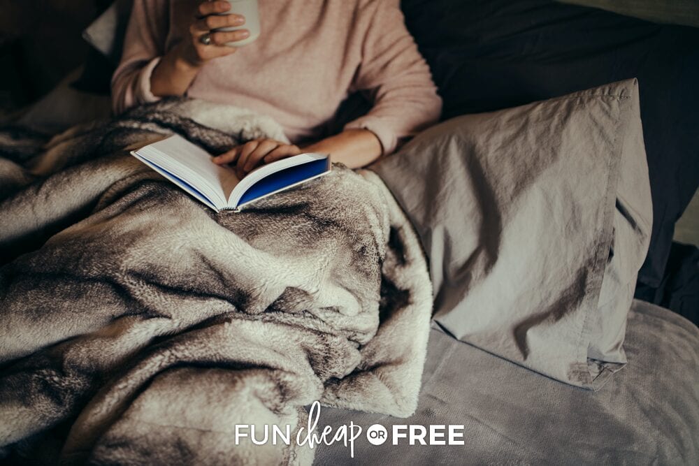 Woman reading in bed, from Fun Cheap or Free