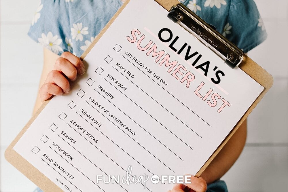 Girl holding clipboard checklist, from Fun Cheap or Free