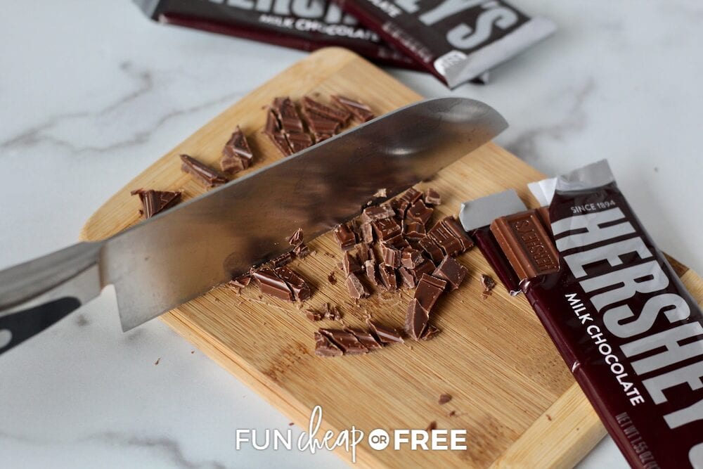 Knife chopping Hershey's candy bar on cutting board, from Fun Cheap or Free