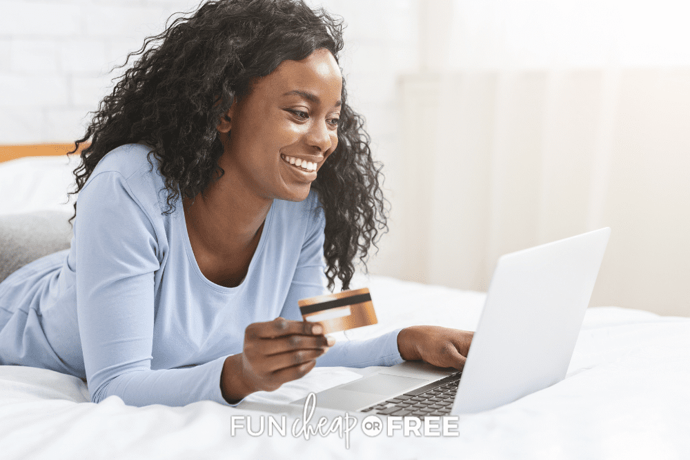 woman smiling and shopping on laptop, from Fun Cheap or Free