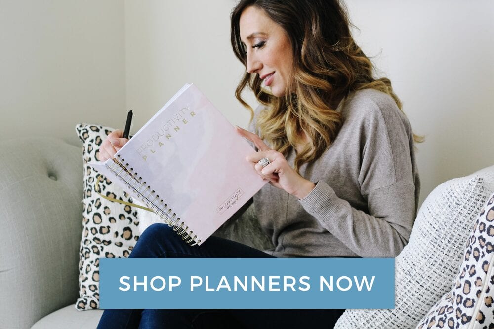 Jordan holding Productivity Planner, from Fun Cheap or Free