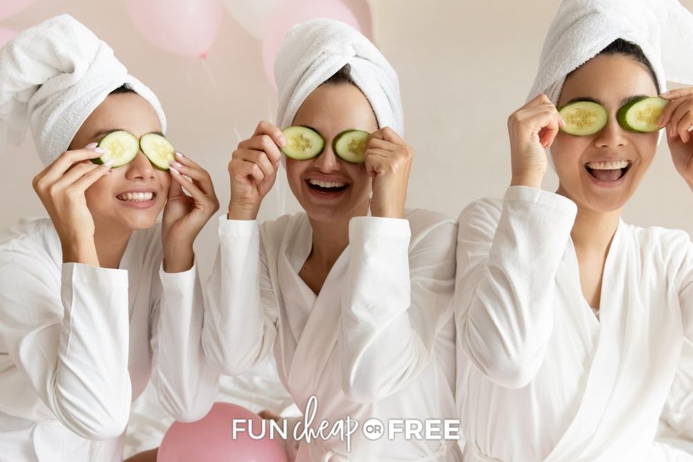 Three women with cucumbers over their eyes for a spa day from Fun Cheap or Free. 
