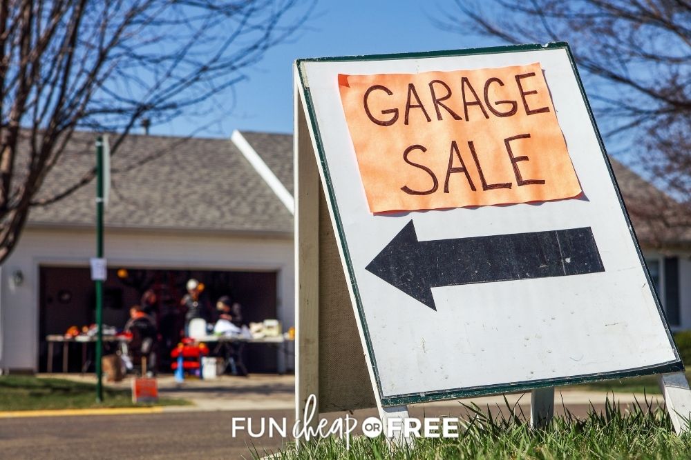 Garage sale sign in front of house from Fun Cheap or Free. 