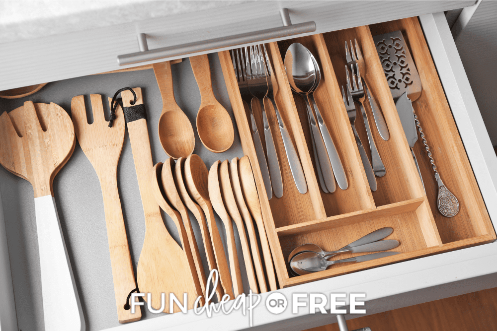 Image of kitchen drawer with well organized silverware and wooden utensils organized. - Fun Cheap Or Free
